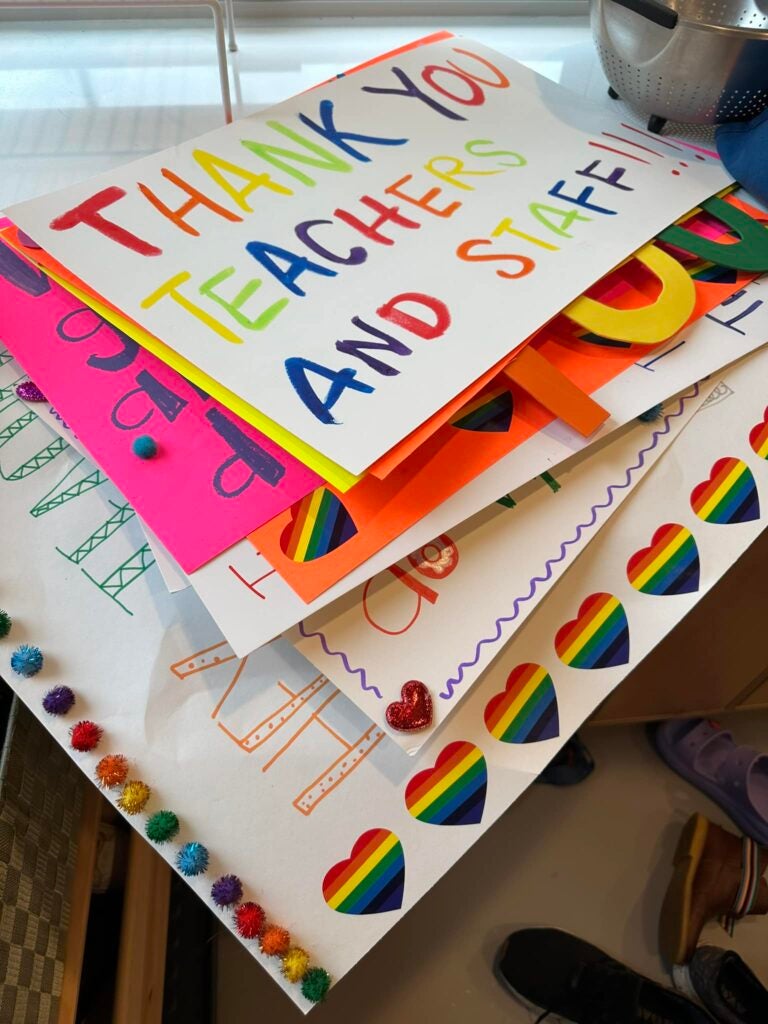Stack of Thank You Teachers and Staff posters.